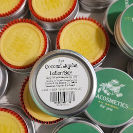 Collection of Tariacosmetics coconut jojoba lotion bars and containers.