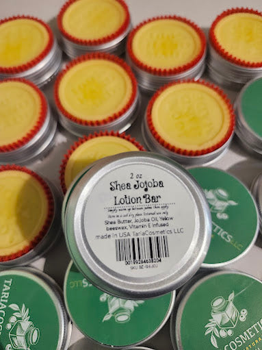 Shea Jojoba Lotion Bars with visible branding on a white background