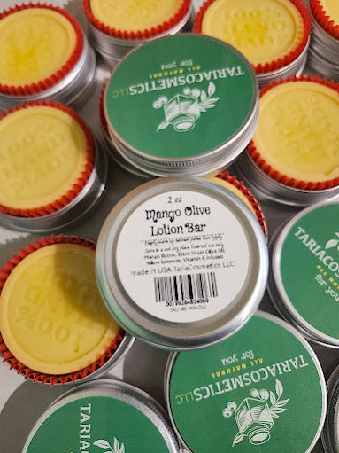 TariaCosmetics lotion bars with green labels and red cookie cups in aluminum tins.