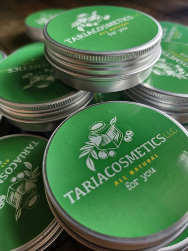 Stacks of TariaCosmetics lotion bar tins